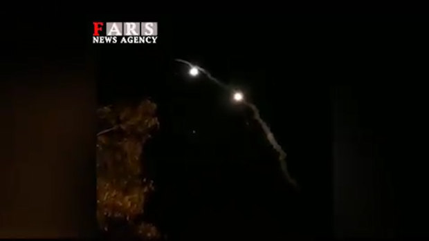 Iran state TV showing a missile attack on a US base.