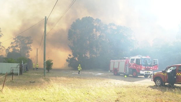 Fire rages around Kearsley in the NSW Hunter Region on Saturday. 