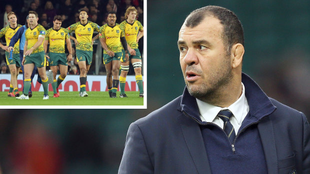 All in a day's work: Wallabies coach Michael Cheika is unconcerned about working out disagreements with Scott Johnson.