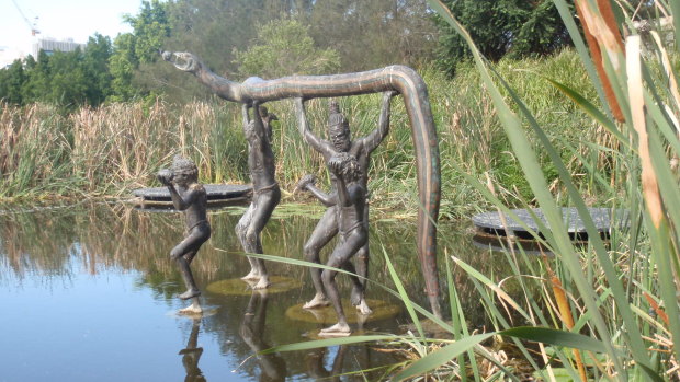 A sculpture in Victoria Park depicting a serpent and her eggs - part of the Turrbal people's Dreaming.