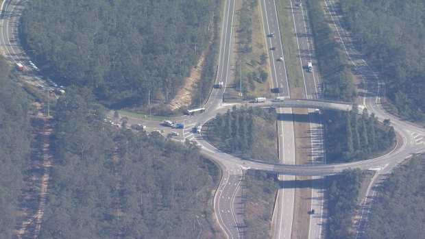 The scene of the bus crash on Monday, next to the Hunter Expressway.