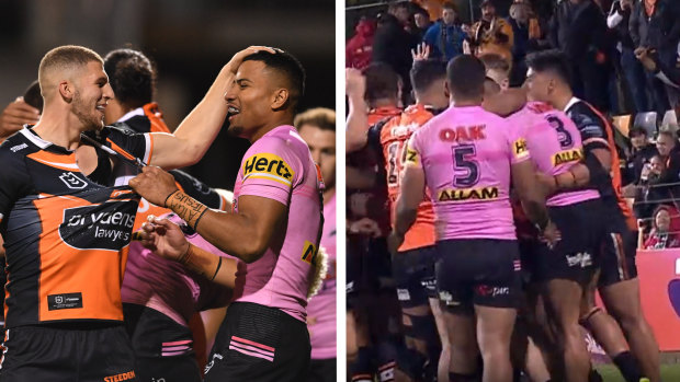 Wests Tigers players drag Stephen Crichton into post-try celebrations on Friday night.
