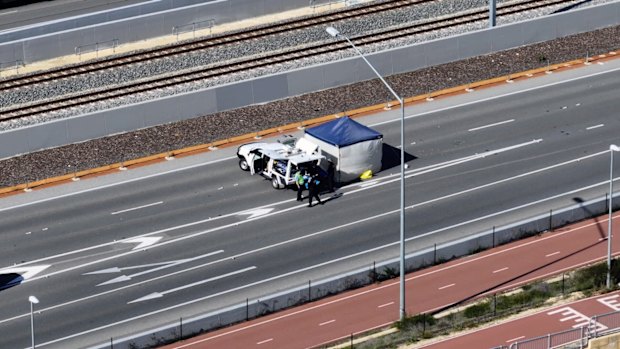 WA Police at the scene of where a man’s body was found on Tonkin Highway in Noranda on Thursday morning. 
