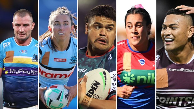 NRL and NRLW players (l-r): Kieran Foran, Quincy Dodd, Latrell Mitchell, Yasmin Clydsdale and Haumole Olakau’atu covering the NRL logo in protest over the collective bargaining agreement talks.