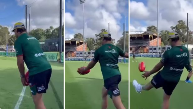 Latrell Mitchell kicks an AFL ball at Richmond’s Punt Road Oval.