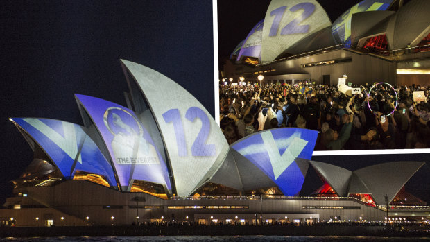 Whiff of snobbery: Protesters oppose the projection of material promoting The Everest onto the sails of the Opera House on Tuesday night.