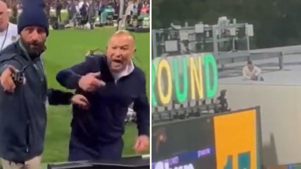 One spectator, shown on the right, has been banned for life from Wallabies Tests after climbing on top of a stand at the SCG.