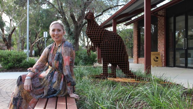 Artist April Pine with Roo Watch, her sculpture installed at the Downer shops on Friday.
