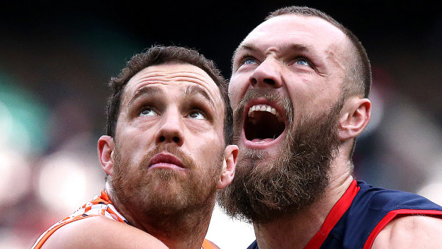 Big battle: Shane Mumford and Max Gawn shape up in the ruck.