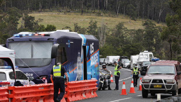 Long lines of traffic line-up to cross  border at Genoa, Victoria.