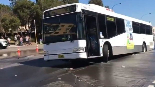 A burst water main caused chaos at Caringbah, with a bus becoming stuck. 