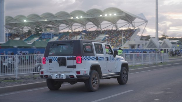 A Chinese-funded police vehicle outside the new Chinese-funded stadium in Honiara.