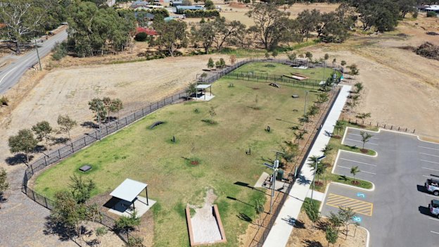 The group parked in a dirt carpark in the Byford area.