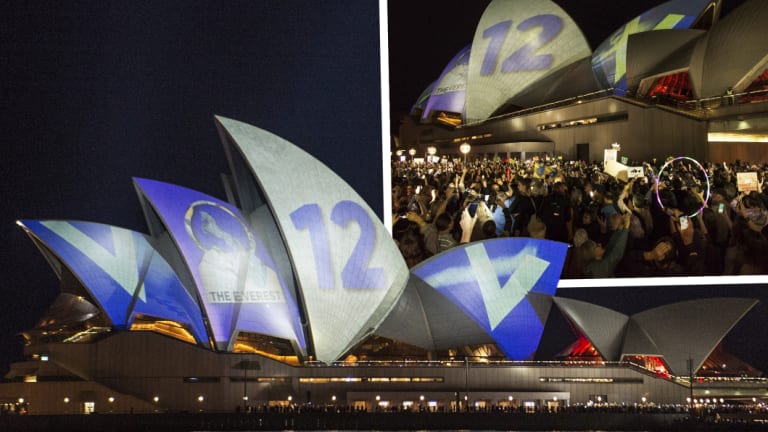 Protesters oppose the projection of material promoting The Everest horse race onto the sails of the Opera House on Tuesday night.