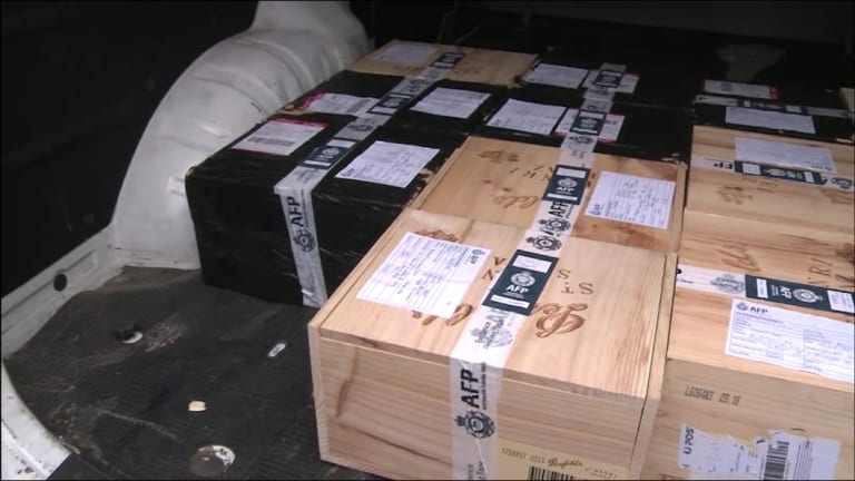 Boxes of what appears to be Penfolds wine were also seized. 