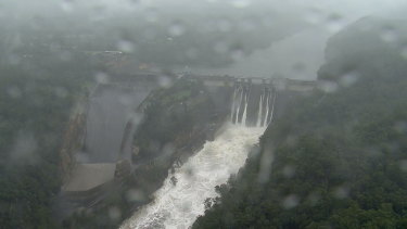 Floodwater spills over Warragamba Dam on Sunday.