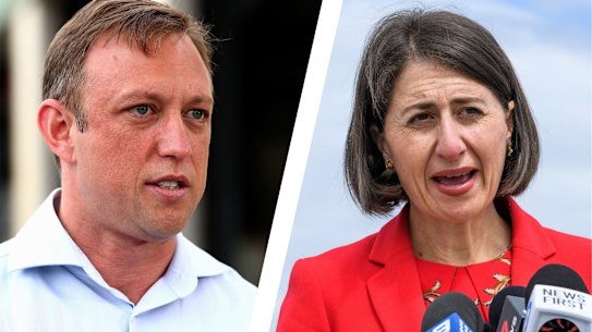 BRISBANE, AUSTRALIA - OCTOBER 12: Deputy Premier Steven Miles speaks at a press conference at an ambulance station on Bribie Island on October 12, 2020 north of Brisbane, Australia. The Queensland state election will be held on 31 October 2020. (Photo by Jono Searle/Getty Images)

NSW Premier Gladys Berejiklian at the opening of the new Batemans Bay Bridge. Batemans Bay, February 23, 2021. Photo: Rhett Wyman/SMH
