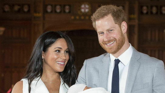 Britain's Prince Harry and Meghan, during a photocall with their newborn son Archie, in St George's Hall at Windsor Castle, Windsor in May, 2019.