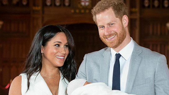 Britain's Prince Harry and Meghan, Duchess of Sussex, during a photocall with their newborn son, in St George's Hall at Windsor Castle, England in May.