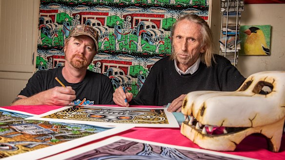 Not master and student: Reg Mombassa and Glenn Smith with linocuts and digital reproductions that will be part of their exhibition Creatures: Losing the War on Nature in Redfern.
