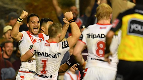 Close call: The Dragons celebrate at full-time.