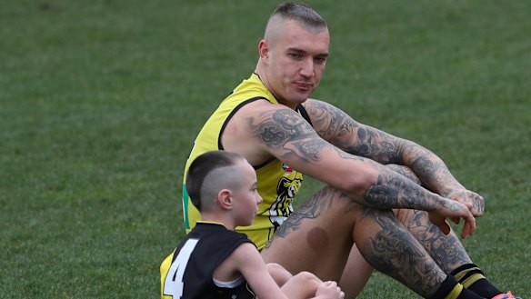 Ryder, 8, with Richmond's star player Dustin Martin.