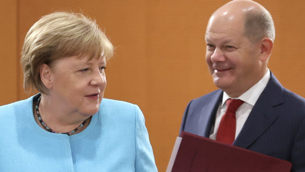 German Chancellor Angela Merkel, of the Christian Democrats, and Finance Minister and Vice-Chancellor Olaf Scholz, of the Social Democrats.