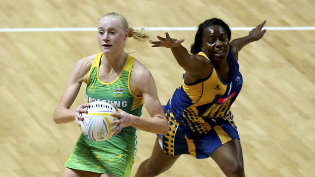 On a roll: Jo Weston helps Australia to their fourth win in as many games at the World Cup. 