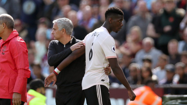 Pogba and Mourinho during the Premier League defeat.