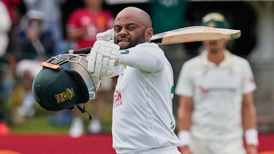 South Africa’s captain Temba Bavuma celebrates after completing his century.