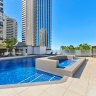 A father and grandfather from Victoria drowned at the Top of the Mark apartment building in Surfers Paradise on Sunday.