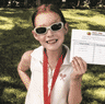 Maya Joint at age 7, after winning her first tournament, and on Tuesday (AEST) celebrating her win over Serena Willia...