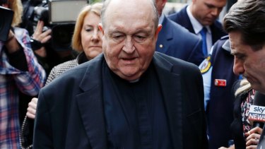 Former archbishop Philip Wilson outside Newcastle Local Court in July.