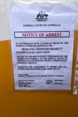 The notice of arrest on the Monster Project.