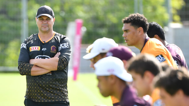 Broncos coach Anthony Seibold puts the players through their paces at training.