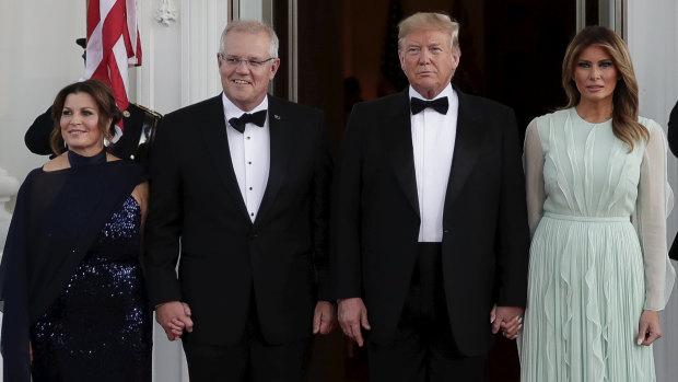 Prime Minister Scott Morrison and his wife Jenny are greeted by US President Donald Trump and his wife Melania before the state dinner.