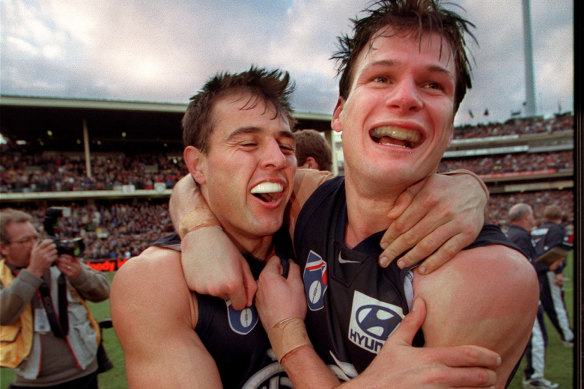 Aaron Hamill (right) with Ben Nelson after the epic 1999 preliminary win over Essendon.