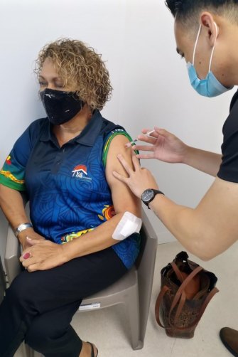 CEO of Yilli Rreung Housing Aboriginal Corporation Leeanne Caton getting vaccinated. 