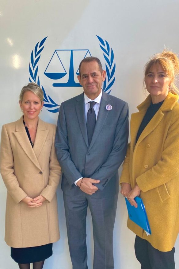 Robinson with Anton Abu Akleh, brother of Al Jazeera journalist Shireen Abu Akleh, and colleague Tatyana Eatwell at the ICC.