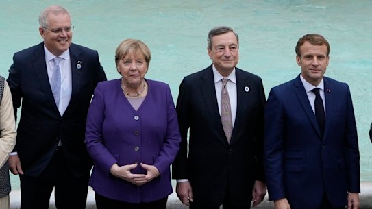 From left, Australian Prime Minister Scott Morrison, German Chancellor Angela Merkel, Italian Prime Minister Mario Draghi, French President Emmanuel Macron and British Prime Minister Boris Johnson.