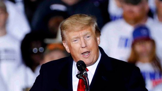 Ex-president Donald Trump speaking at a rally in Texas where he discussed pardoning convicted January insurrectionists. 