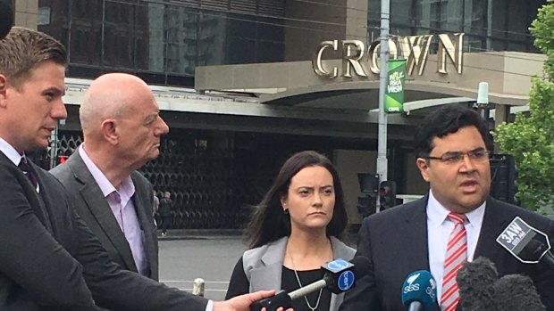 Tim Costello (second from left) at a press conference outside Crown Casino in 2016 with Shonica Guy. Her case that the casino's "Dolphin Treasure" poker machines fed gambling addictions ultimately failed.
