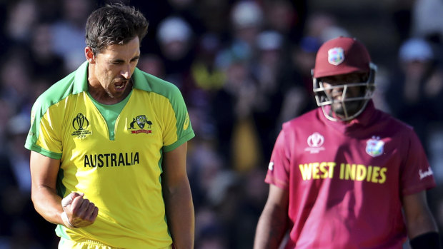 Mitchell Starc celebrates the dismissal of West Indies' captain Jason Holder.