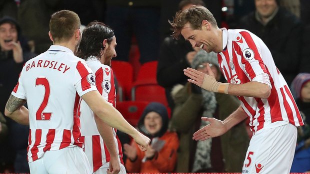 At age 38, Peter Crouch (right) is back in the Premier League.