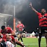 Sevu Reece of the Crusaders celebrates after Tamaiti Williams scores against the Reds.