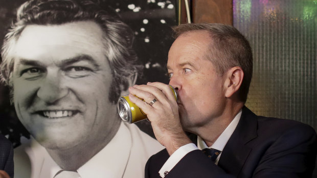 Opposition Leader Bill Shorten has a beer (Hawke's Patio Ale) in memory of former PM Bob Hawke at the John Curtin Hotel in Melbourne on Friday.