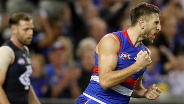 Bulldogs skipper Marcus Bontempelli celebrates a goal during his side’s clash with Carlton at Marvel Stadium.