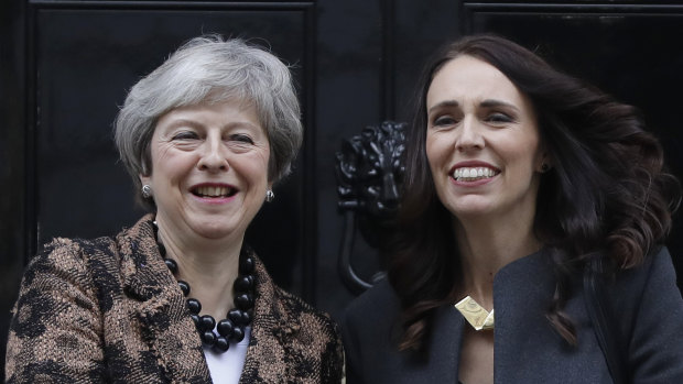 British Prime Minister Theresa May, left, welcomes New Zealand counterpart Jacinda Ardern to Downing Street.