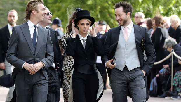 Cara Delevingne caused a stir with her royal wedding suit.