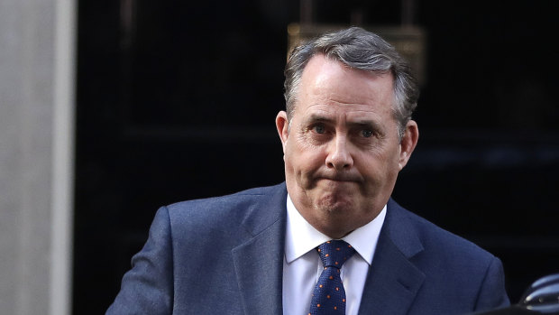 Britain's Secretary of State for International Trade Liam Fox leaves 10 Downing Street in London after a cabinet meeting, Tuesday.